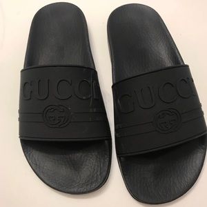 Gucci logo slides